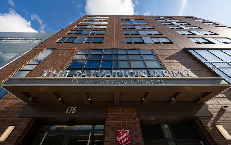 An upward angle of the facade of the Salvation Army building on 125th and Lexington Ave in Manhattan, New York